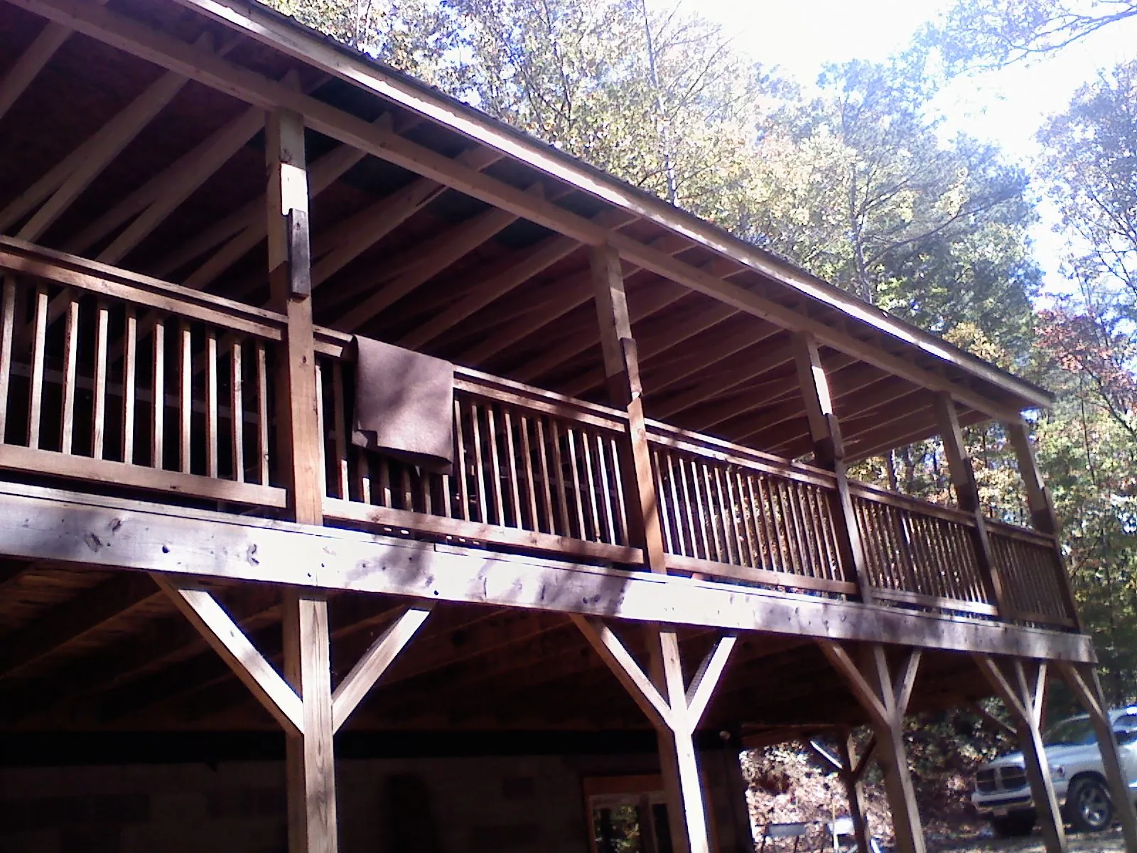 Timber framing under a new elevated porch and deck — Roof Leak Repair in Lapeer by Roofing Brothers